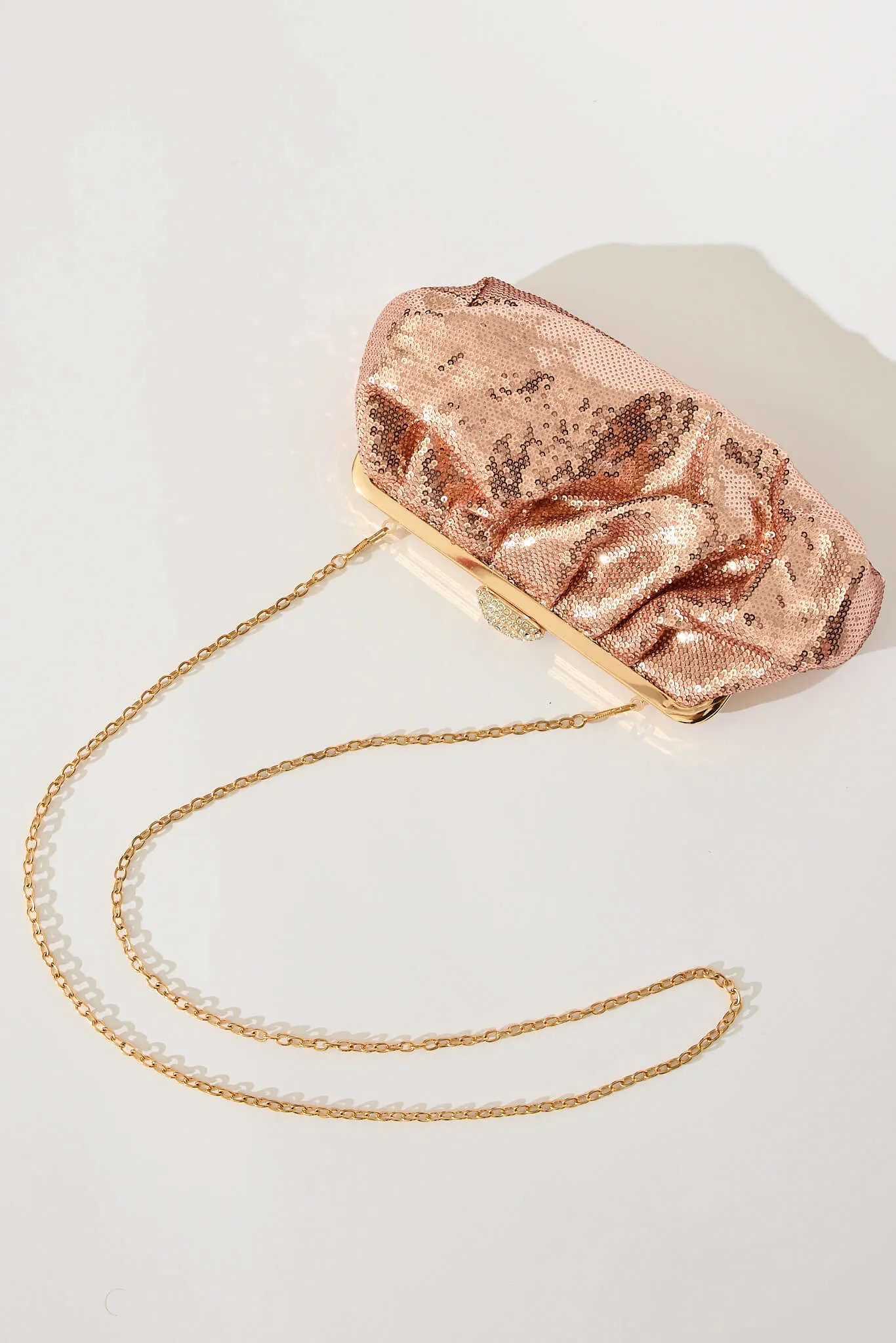 Aida Clutch Bag In Rose Gold Sequin